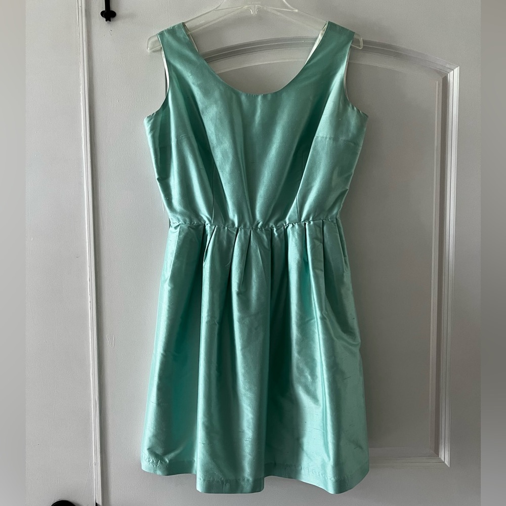 LaRoque original silk dress. Size 6. Worn once. Light blue. Removable bow.